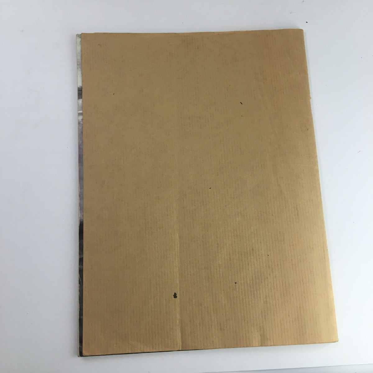 Back cover of Heavy Metal Magazine September 1983, showcasing a plain brown design, representing its vintage aesthetic.