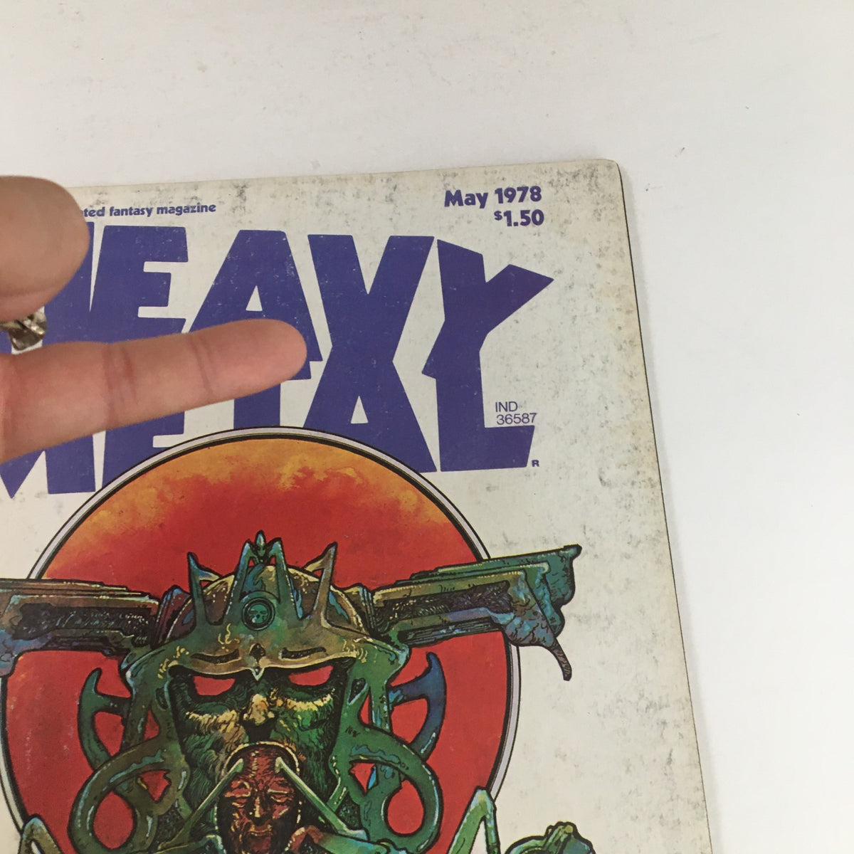 Detailed look at the cover of Heavy Metal Magazine May 1978, illustrating the vivid colors and imaginative characters that define this collectible publication.