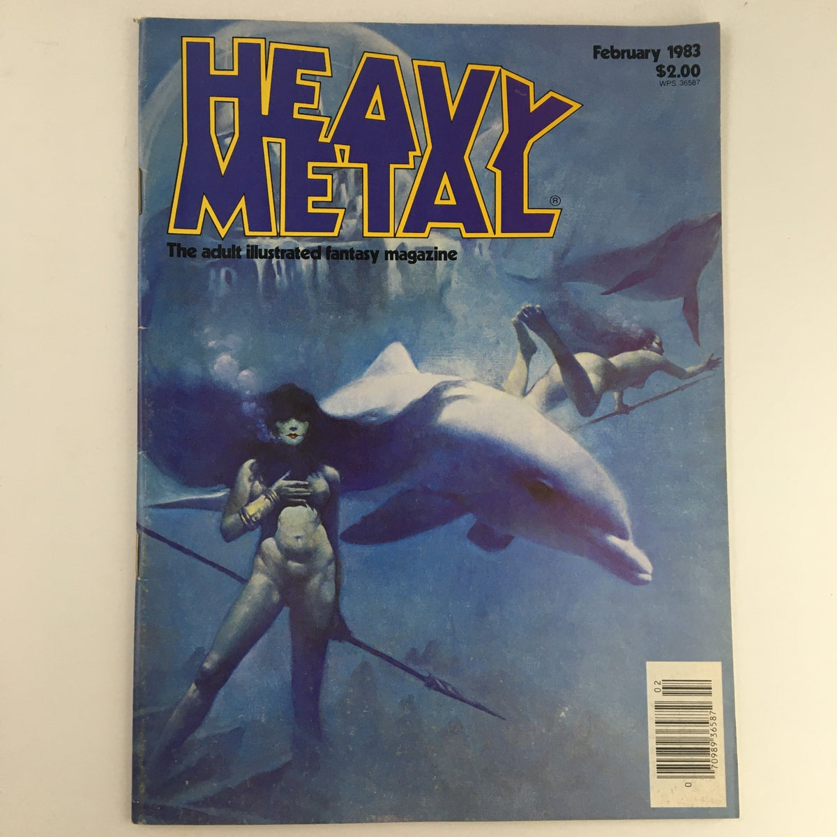 Cover of Heavy Metal Magazine February 1983 featuring the title and artwork showcasing fantasy elements.