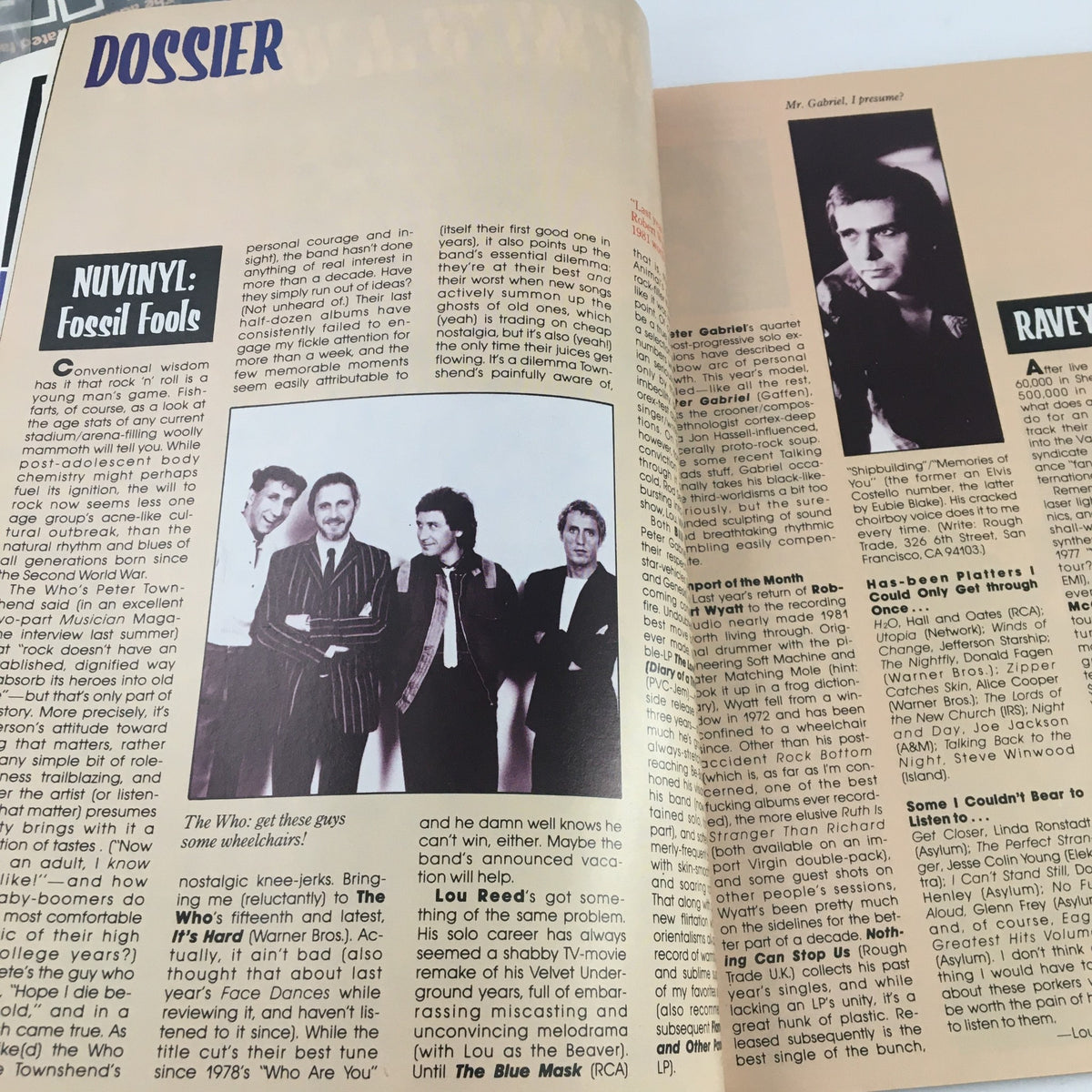Dossier section of Heavy Metal Magazine February 1983, highlighting music and pop culture features with an image of a rock band.