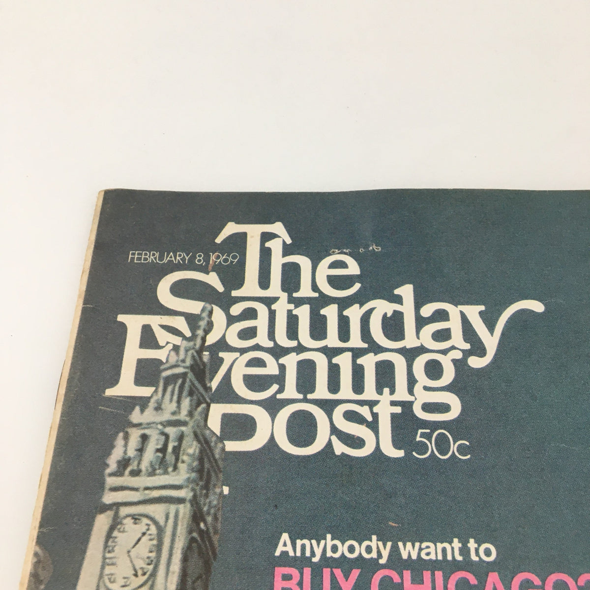 Close-up of The Saturday Evening Post from February 8, 1969, highlighting the magazine title and date, focusing on its cover design and text discussing Chicago.