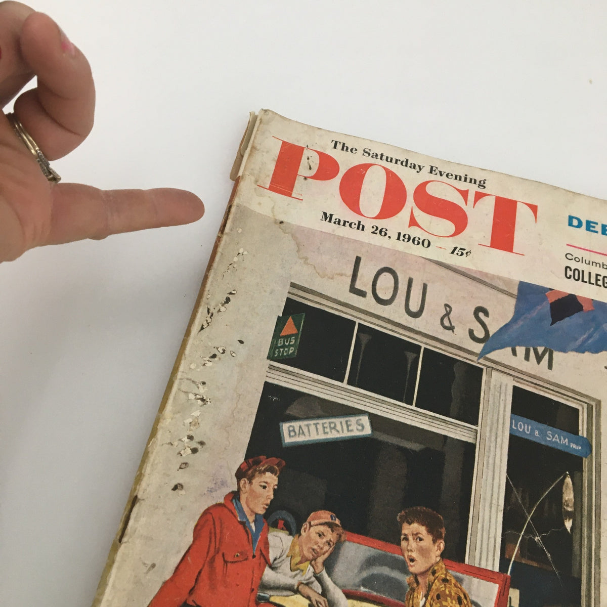 Close-up view of The Saturday Evening Post March 26 1960 cover showing details of I Call On Debbie Reynolds by Pete Martin, with emphasis on the magazine's vintage design and condition.