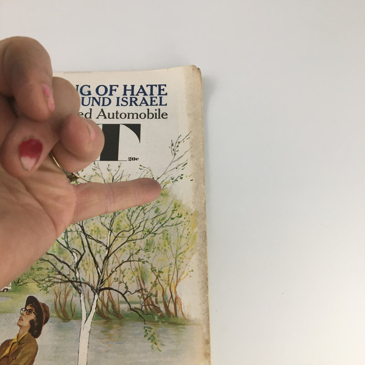 Close-up of the cover of The Saturday Evening Post, March 24, 1962, featuring the title 'Arab Refugees Ring of Hate Around Israel' and an artistic illustration of a woman with a tree backdrop.