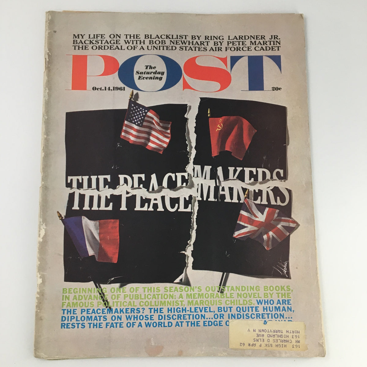 Cover of The Saturday Evening Post from October 14, 1961, featuring a colorful design and article titled 'The Peacemakers' with damaged edges, showcasing flags and a nostalgic look back at American culture.