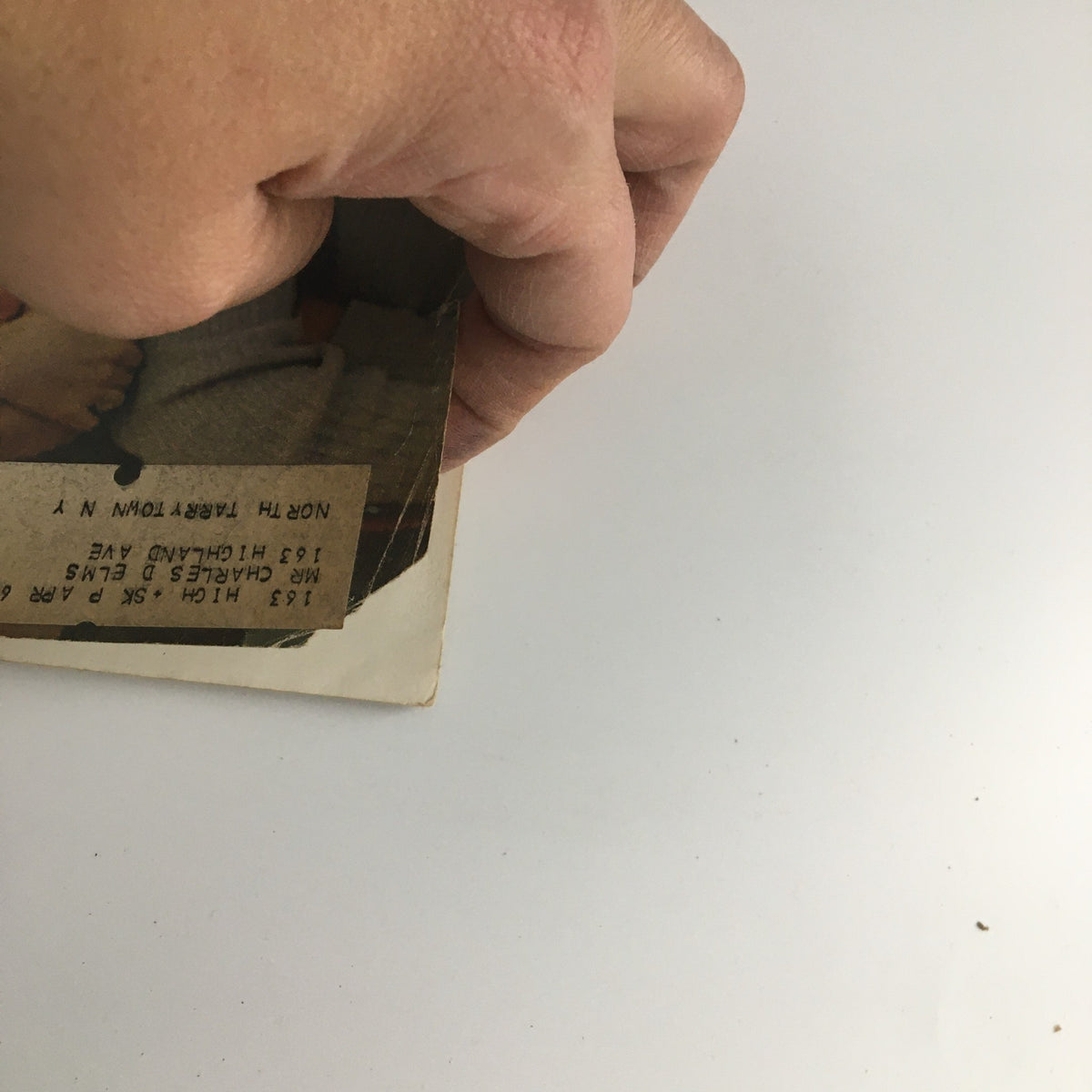 Image of the December 23-30, 1961 issue of The Saturday Evening Post, showcasing a hand holding the magazine, highlighting used condition with minor wear and an address label on the front.
