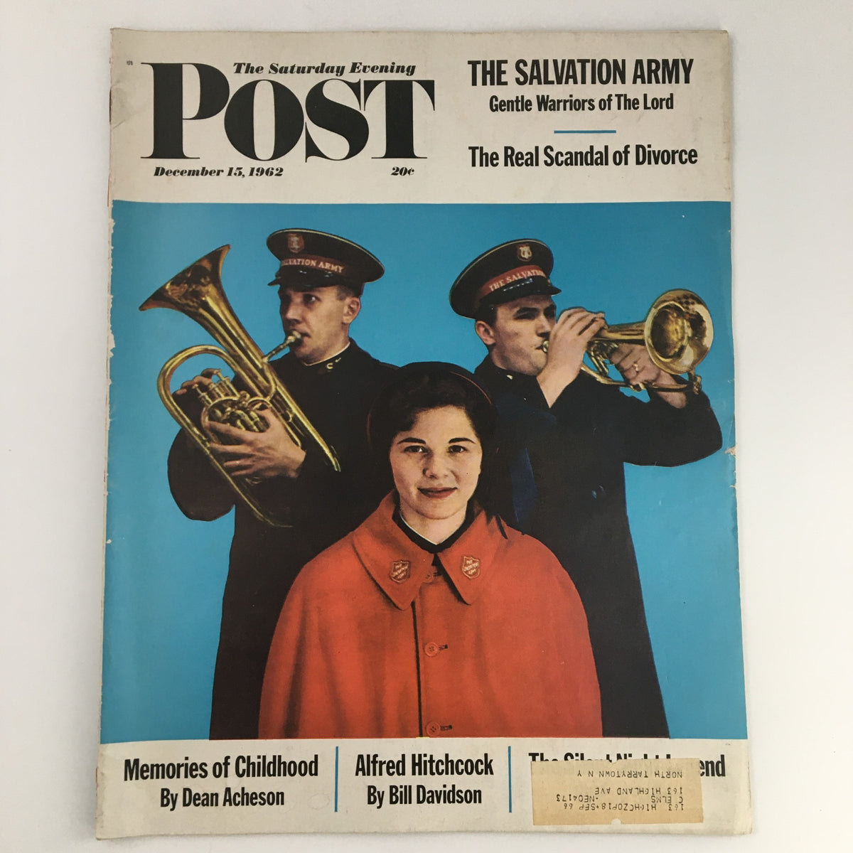 Cover of The Saturday Evening Post December 15, 1962, featuring iconic imagery with the title, along with musicians from The Salvation Army and a young girl in a red coat, highlighting notable articles including Alfred Hitchcock by Bill Davidson.