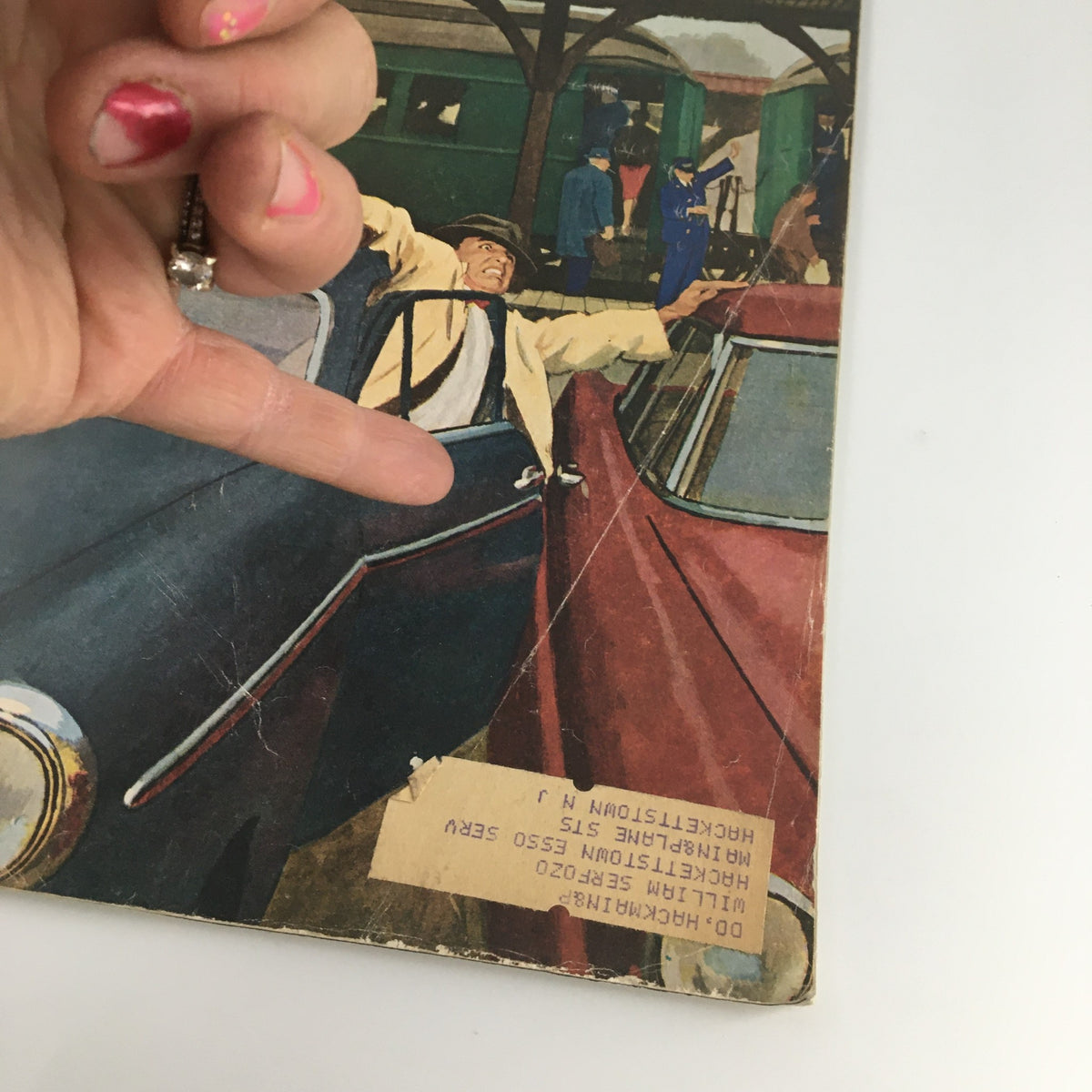 Side view of The Saturday Evening Post cover dated March 5, 1960, demonstrating wear and tear, and showcasing the illustration of individuals interacting around a car, with the text 'After Khrushchev, Who?'