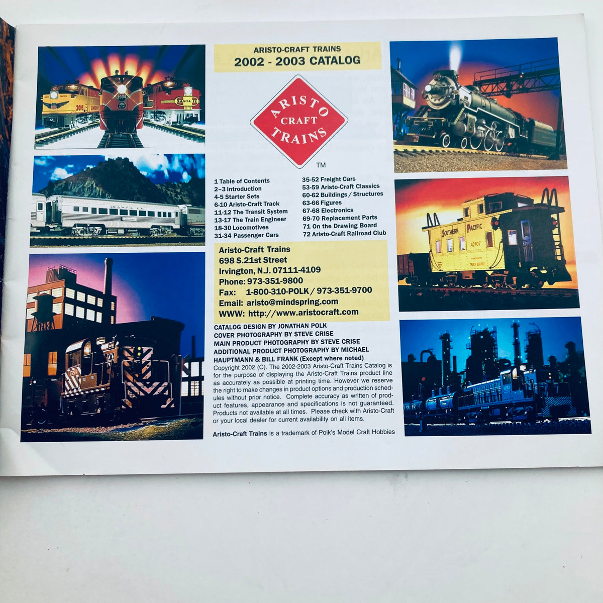 Interior page of the 2002 - 2003 Aristo-Craft Trains Catalog displaying various model trains and accessories, including a table of contents.