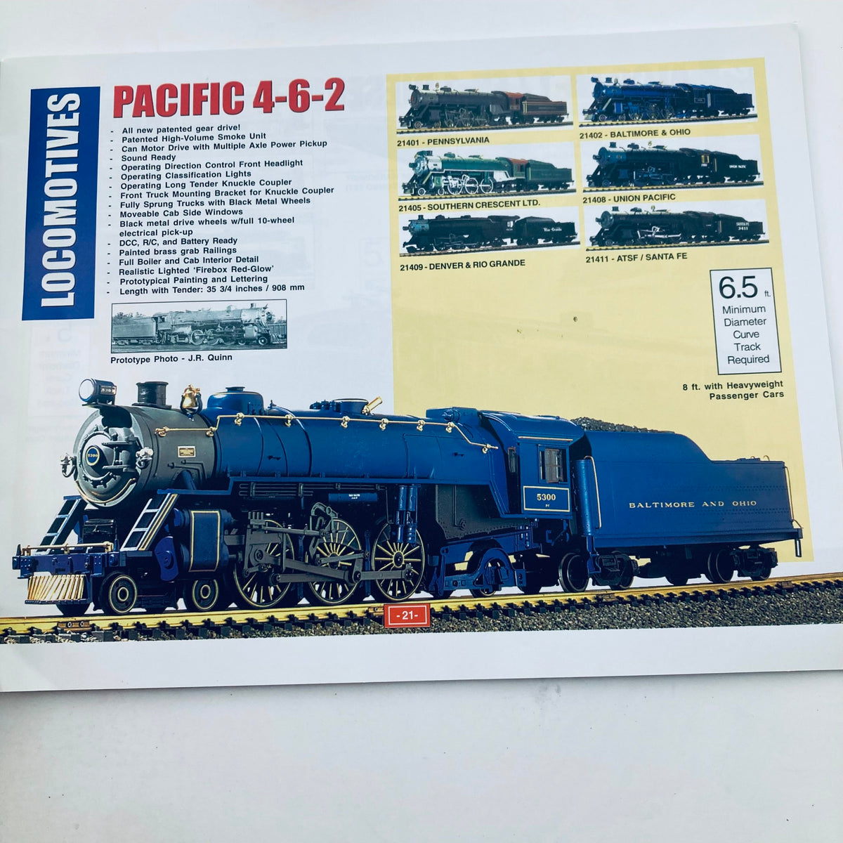 2002 - 2003 Aristo-Craft Trains Catalog The Transit System showcasing a detailed illustration of a Pacific 4-6-2 locomotive model, featuring Baltimore and Ohio branding, highlighting its craftsmanship for model train enthusiasts.