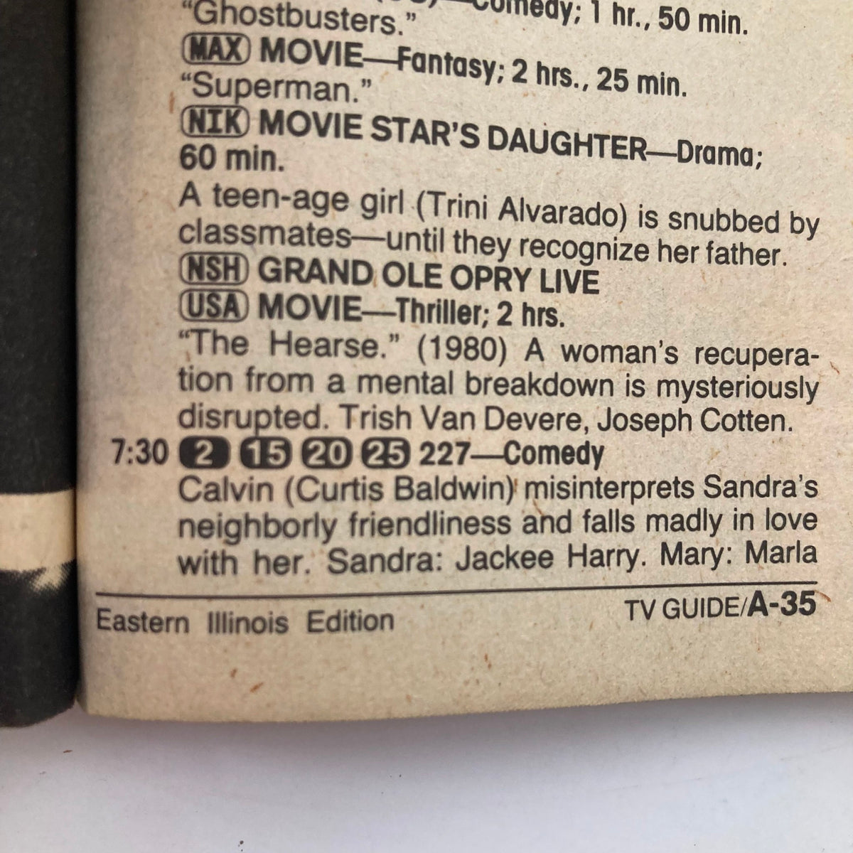 Inside page of the TV Guide Magazine September 13, 1986, showcasing TV listings including programs like 'Grand Ole Opry Live' and 'The Hearse,' specific to the Eastern Illinois Edition.