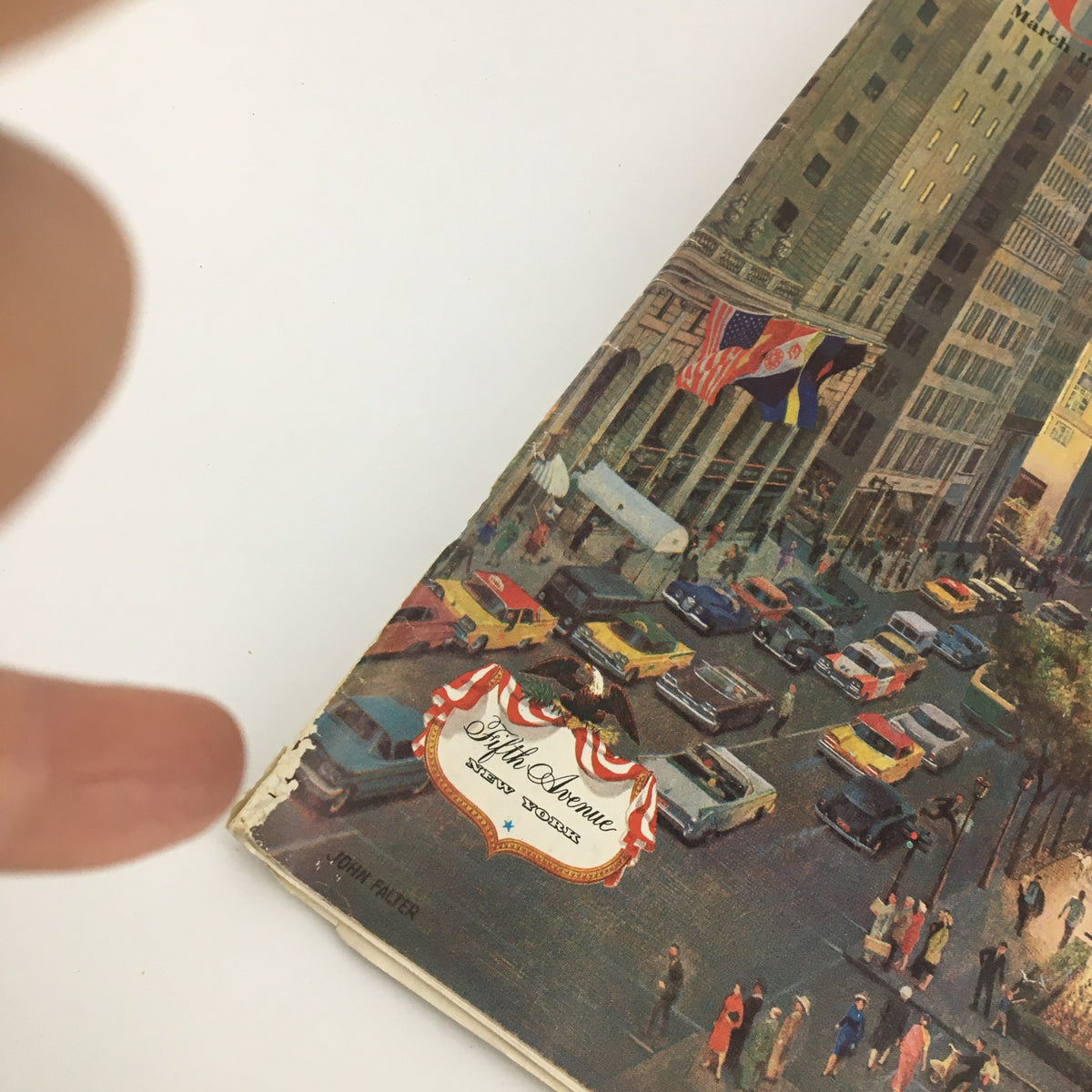 Close-up view of the cover of The Saturday Evening Post March 19 1960, highlighting the magazine's title and artwork of Fifth Avenue, with cars and city life, focusing on the article about 'The Democratic Candidates'.