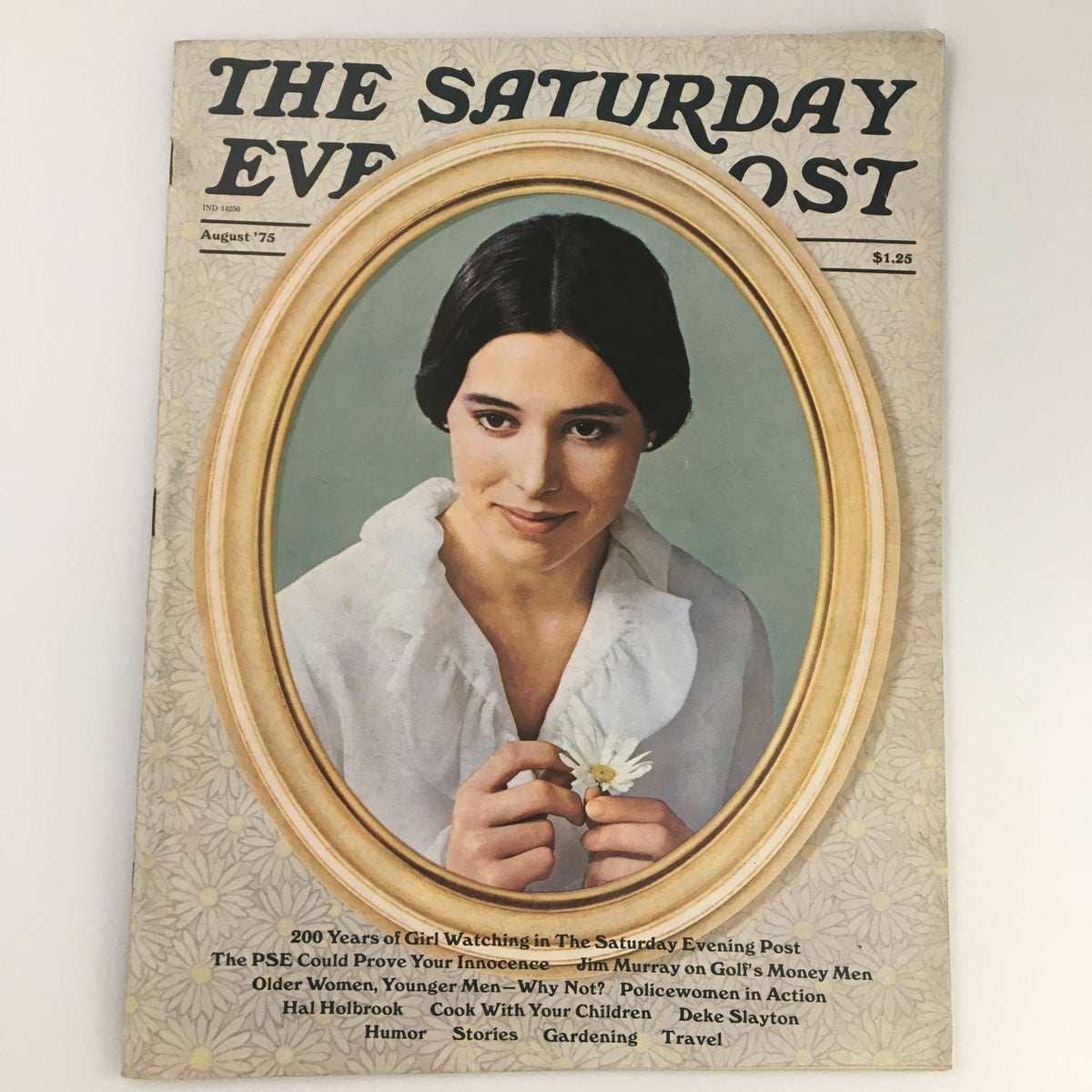 Cover of The Saturday Evening Post August 1975 featuring a woman holding a daisy, highlighting the Deke Slayton and Jim Murray issue, available at newsstands.
