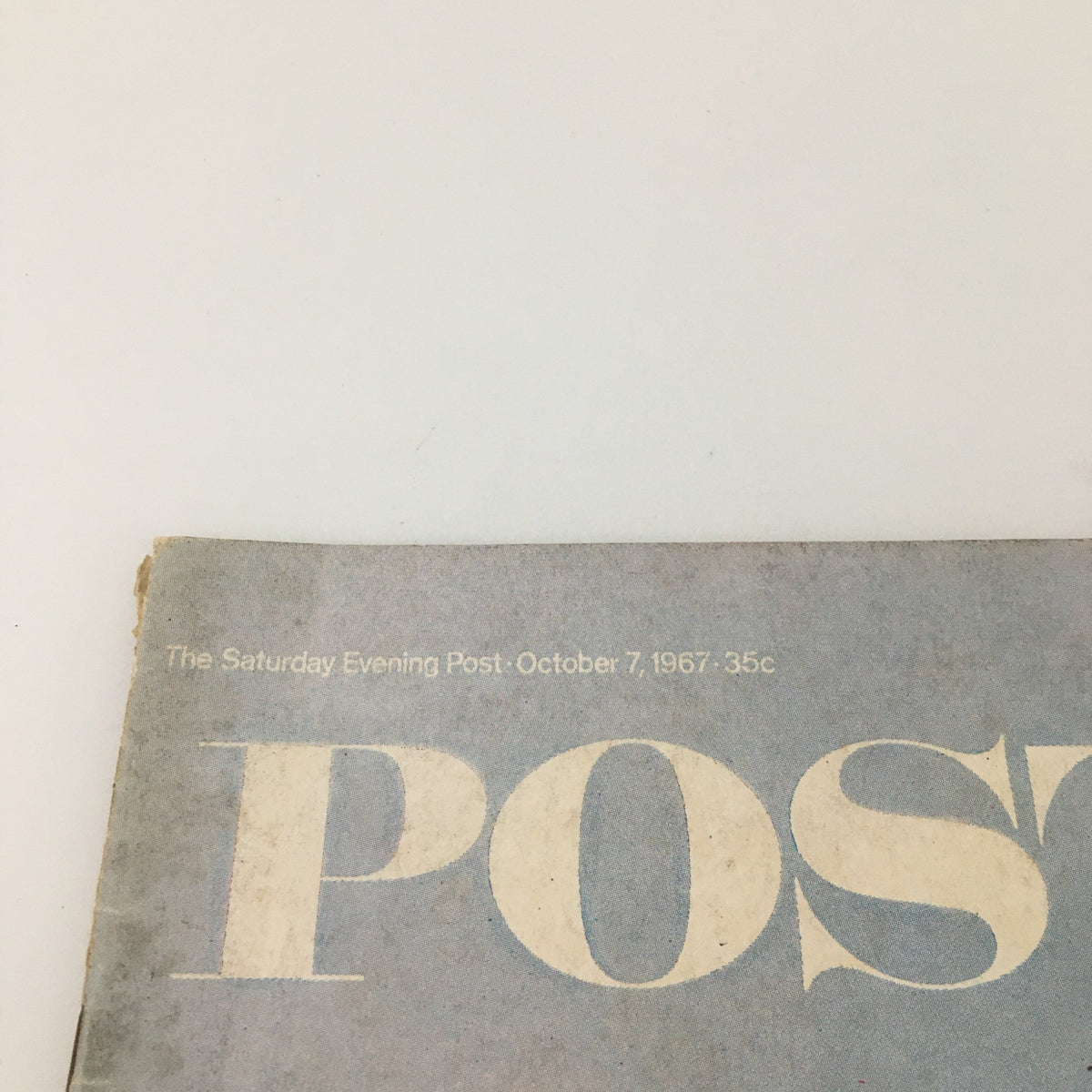 Top view of The Saturday Evening Post magazine dated October 7, 1967, showcasing the prominent title 'POST' along with the date and price.