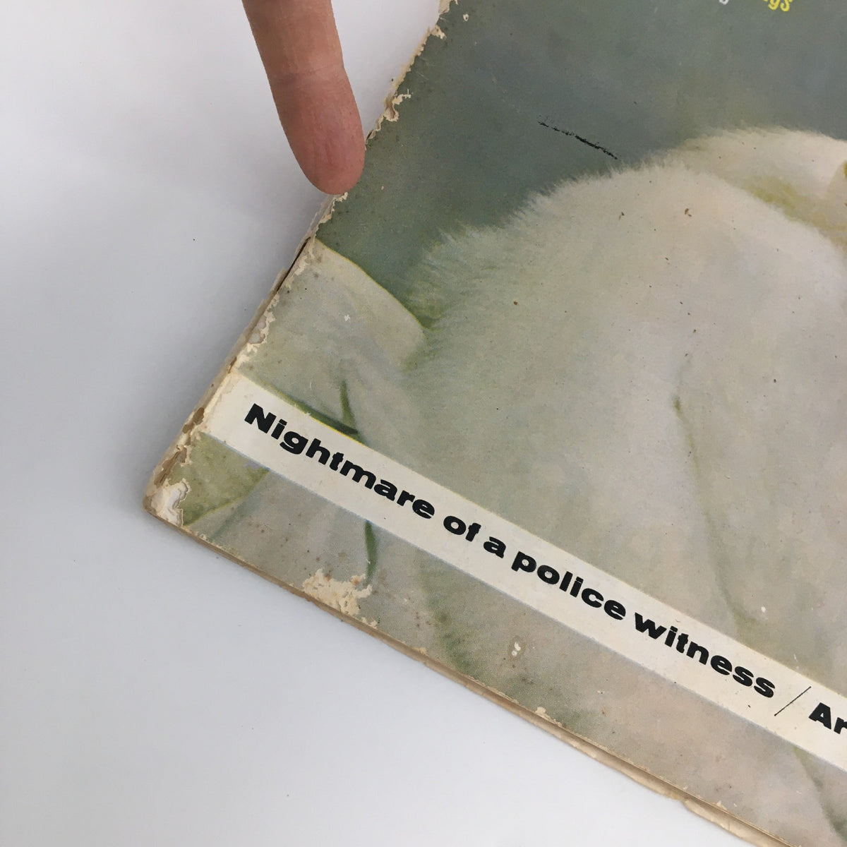 Detail of The Saturday Evening Post November 2, 1963 showing the edge of the magazine with vintage wear, emphasizing its collectible nature.