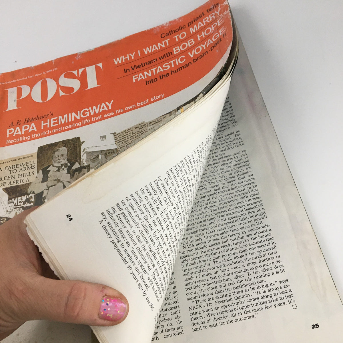Inside view of The Saturday Evening Post dated March 12, 1966, depicting pages of content and wear consistent with a vintage publication.