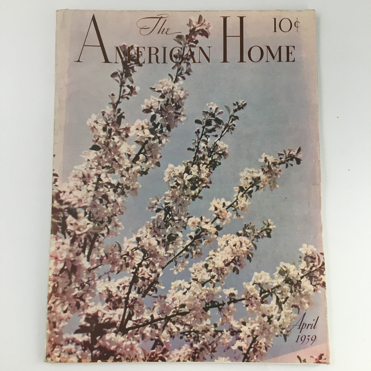 Cover of VTG The American Home Magazine April 1939 featuring stunning floral imagery and vintage design elements.