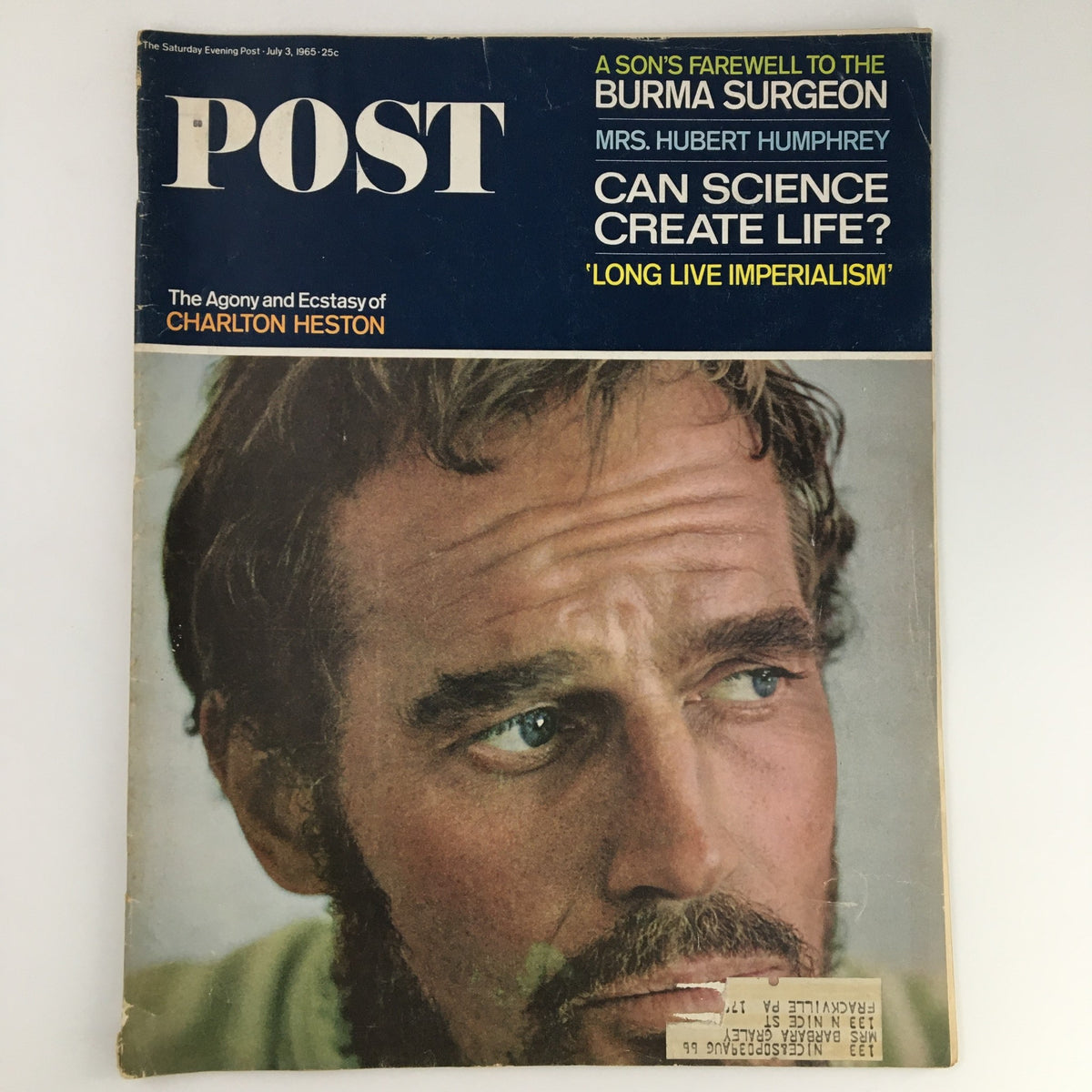 The Saturday Evening Post July 3 1965 cover featuring the Agony and Ecstasy of Charlton Heston, showcasing a close-up portrait of the actor with a thoughtful expression. This vintage magazine cover captures the essence of classic cinema.