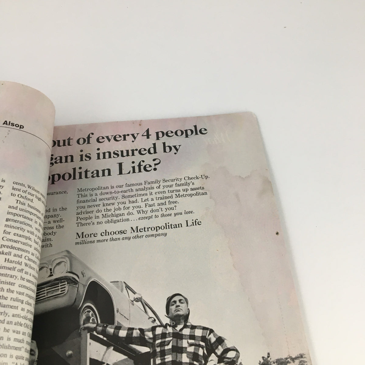 Inside spread of The Saturday Evening Post December 12, 1964, showing an advertisement and part of the magazine layout.