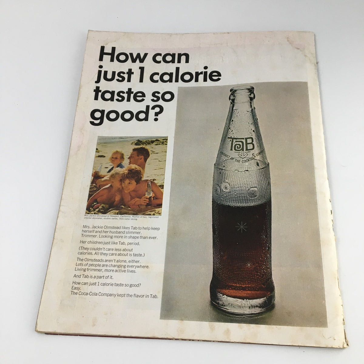 Page from The Saturday Evening Post October 9, 1965 showing an advertisement for Tab soda, emphasizing vintage design elements and wear.