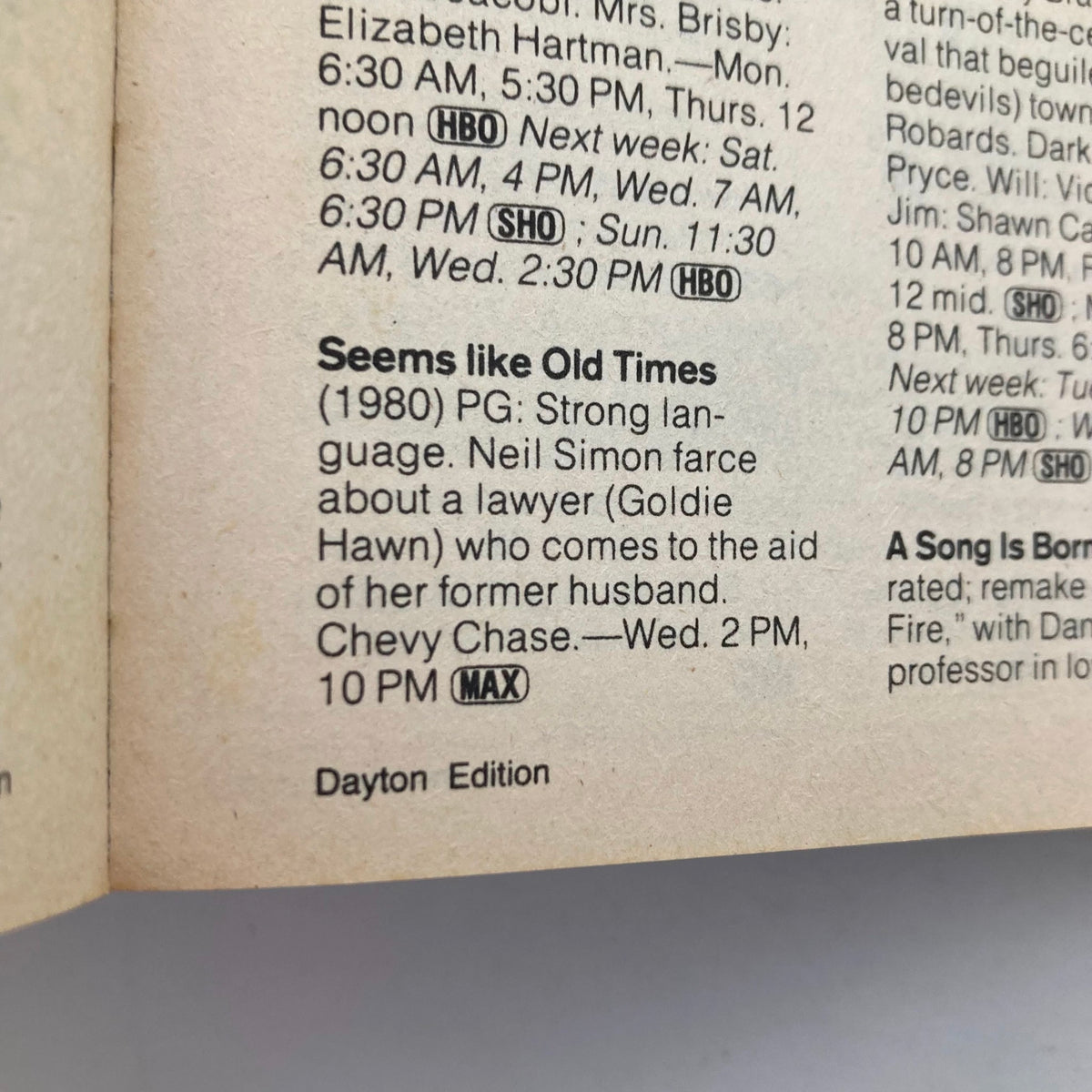 Interior page of TV Guide Magazine June 8, 1985 featuring movie listings including 'Seems like Old Times' starring Chevy Chase and Goldie Hawn, along with broadcast information for various channels, reflecting mid-1980s television culture.