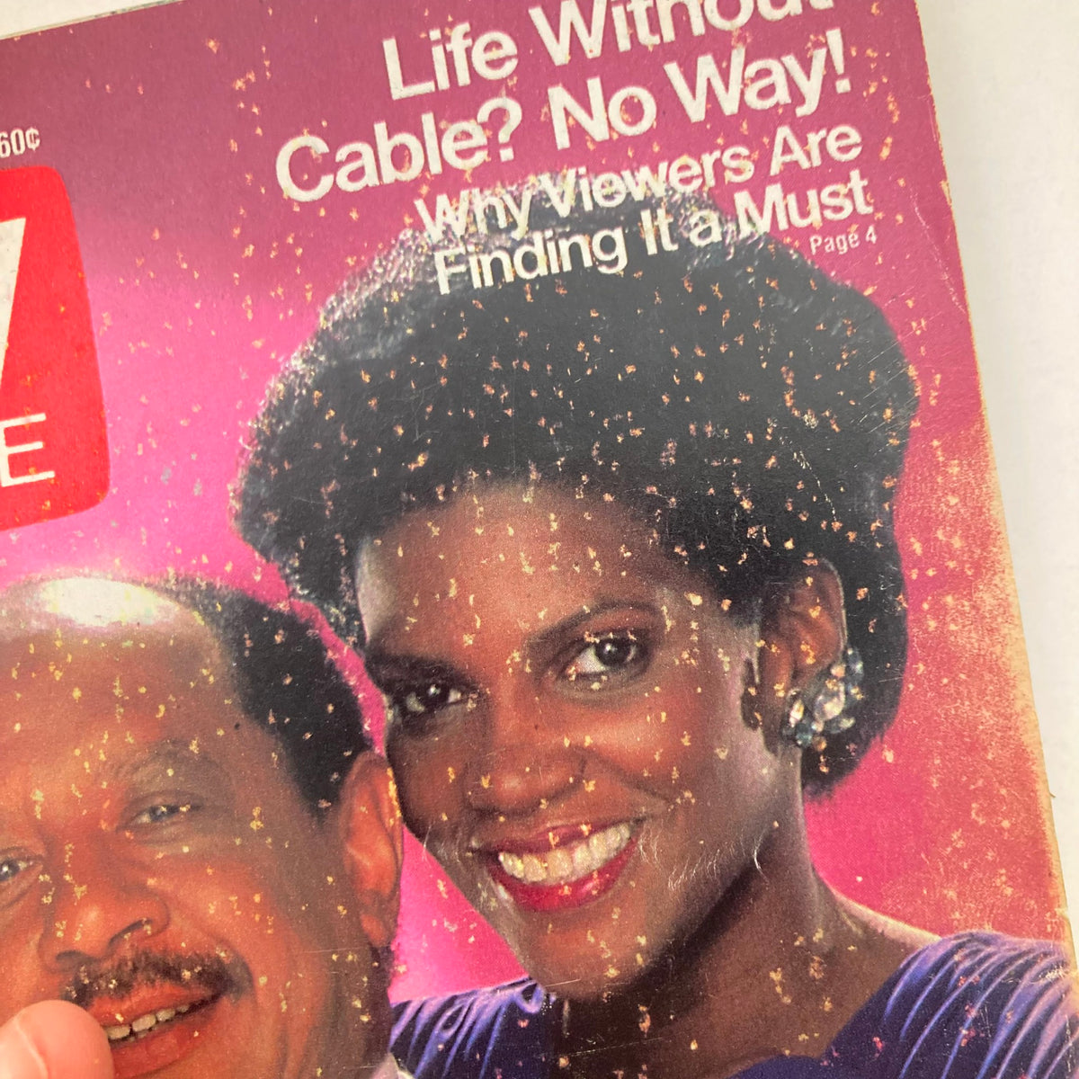 Close-up of the TV Guide Magazine cover August 29, 1987, showcasing the smiling faces of Sherman Hemsley and Anna Maria Horsford with a bold headline about cable television.
