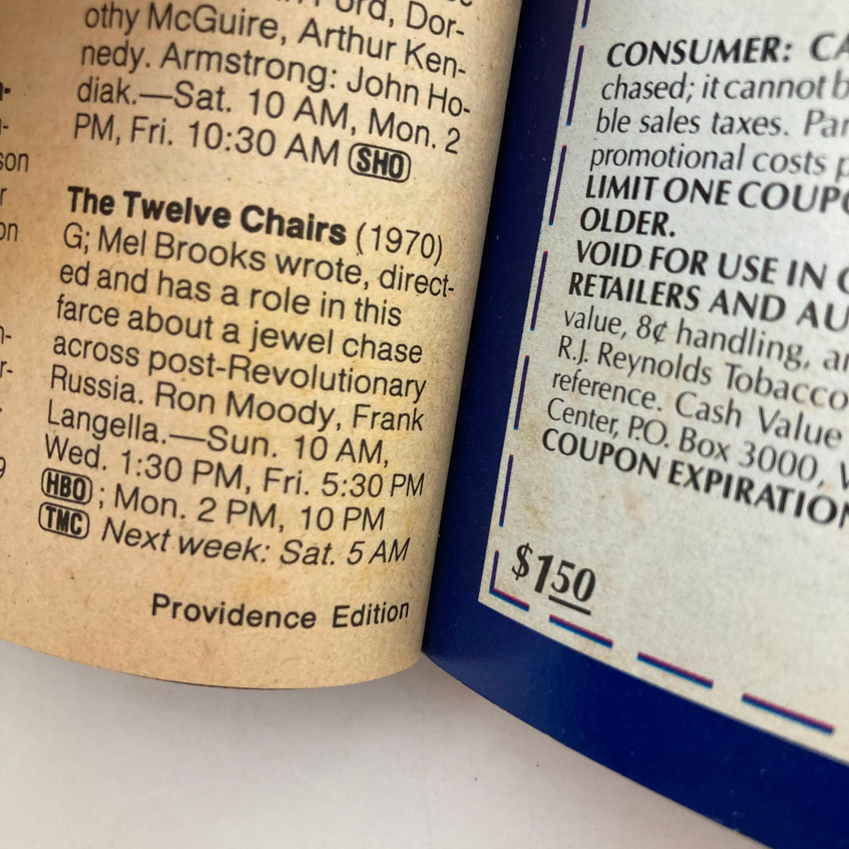 Inside page of TV Guide Magazine December 22 1984 detailing the schedule for the film 'The Twelve Chairs' (1970) with listings and pricing information. It notes that this is the Providence Edition.