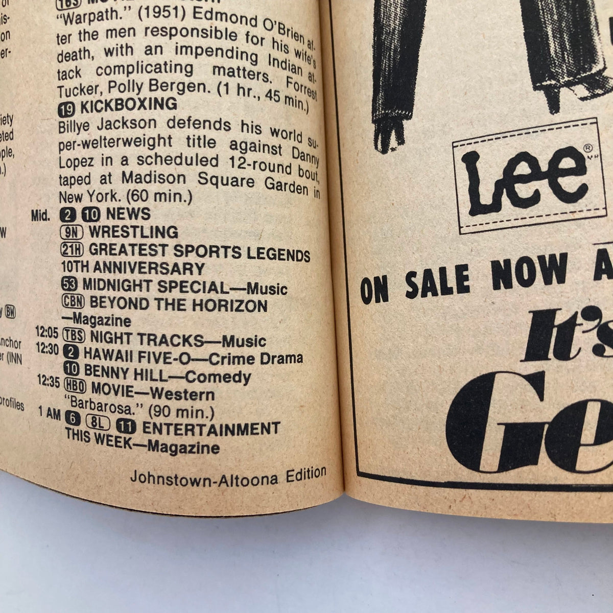 Inside page of TV Guide Magazine from August 27, 1983 featuring scheduled program listings for the Johnstown-Altoona edition, including shows like 'Wrestling', 'Benny Hill', and 'Night Tracks'.