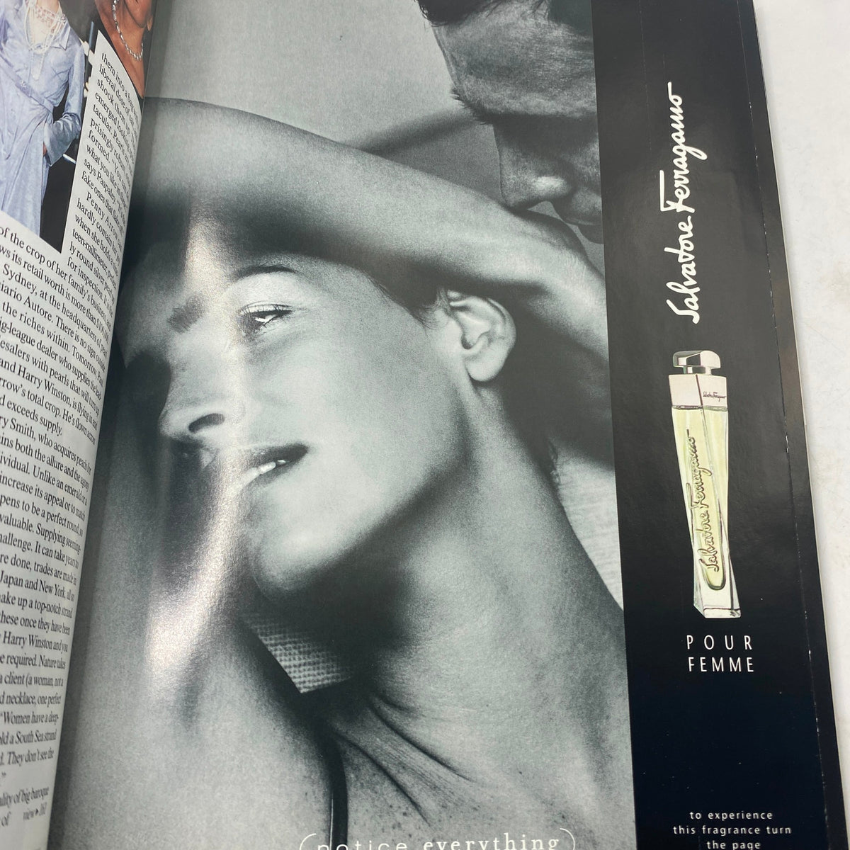Ad page from Vogue Magazine October 1998 in black and white featuring a profile of a model with a fragrance advertisement for Salvatore Ferragamo Pour Femme.