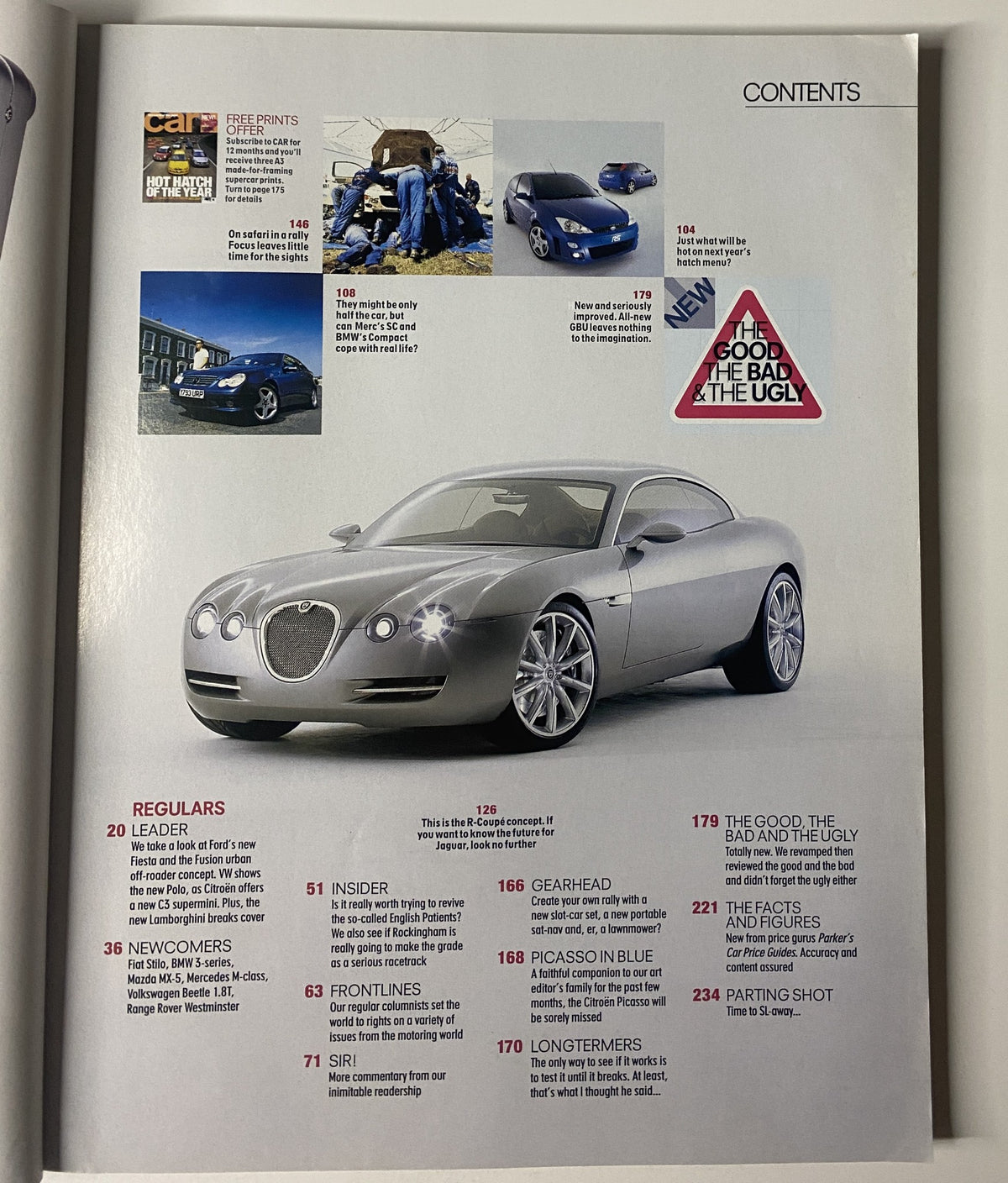 Contents page from Car Magazine October 2001, detailing articles and features including the hot hatch shootout, newcomers section, and insights on the automotive industry, highlighted by the striking R-Coupe concept car.