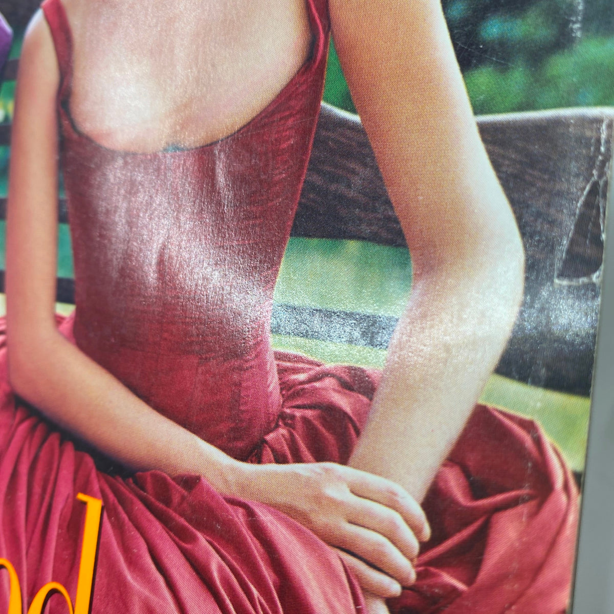 Detail of Vogue Magazine September 1995 featuring a model in a red dress, showcasing fashion design trends with no label. Great condition for its age.