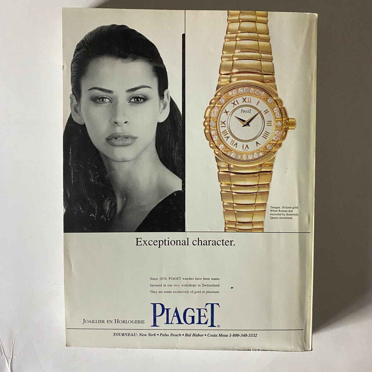 Advertisement for Piaget featuring a model with striking features next to a luxurious gold watch, promoting exceptional character, from Vogue Magazine September 1995.