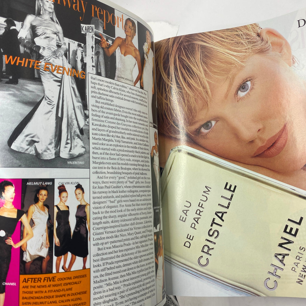 Vogue Magazine July 1995 - image of a model showcasing Chanel Cristalle perfume with a fashion report background featuring runway styles.