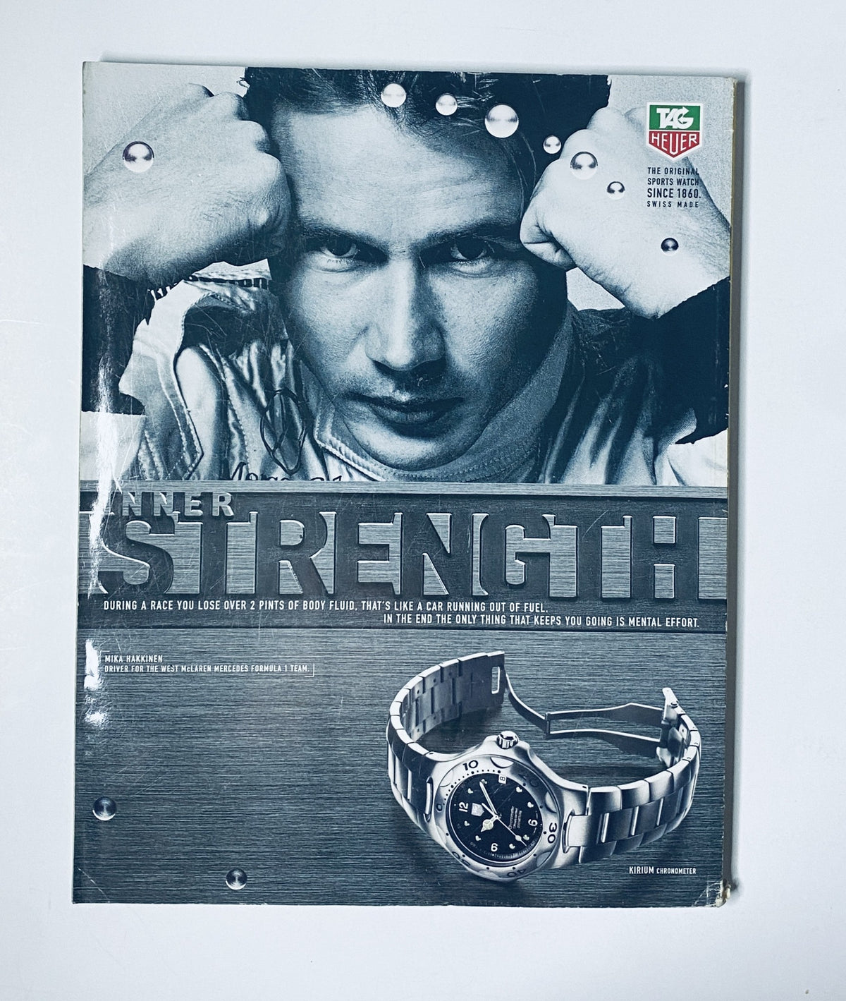 Advertisement page from Car Magazine December 1998 featuring a TAG Heuer watch, emphasizing the theme of 'Inner Strength' related to motorsport and automotive lifestyle.