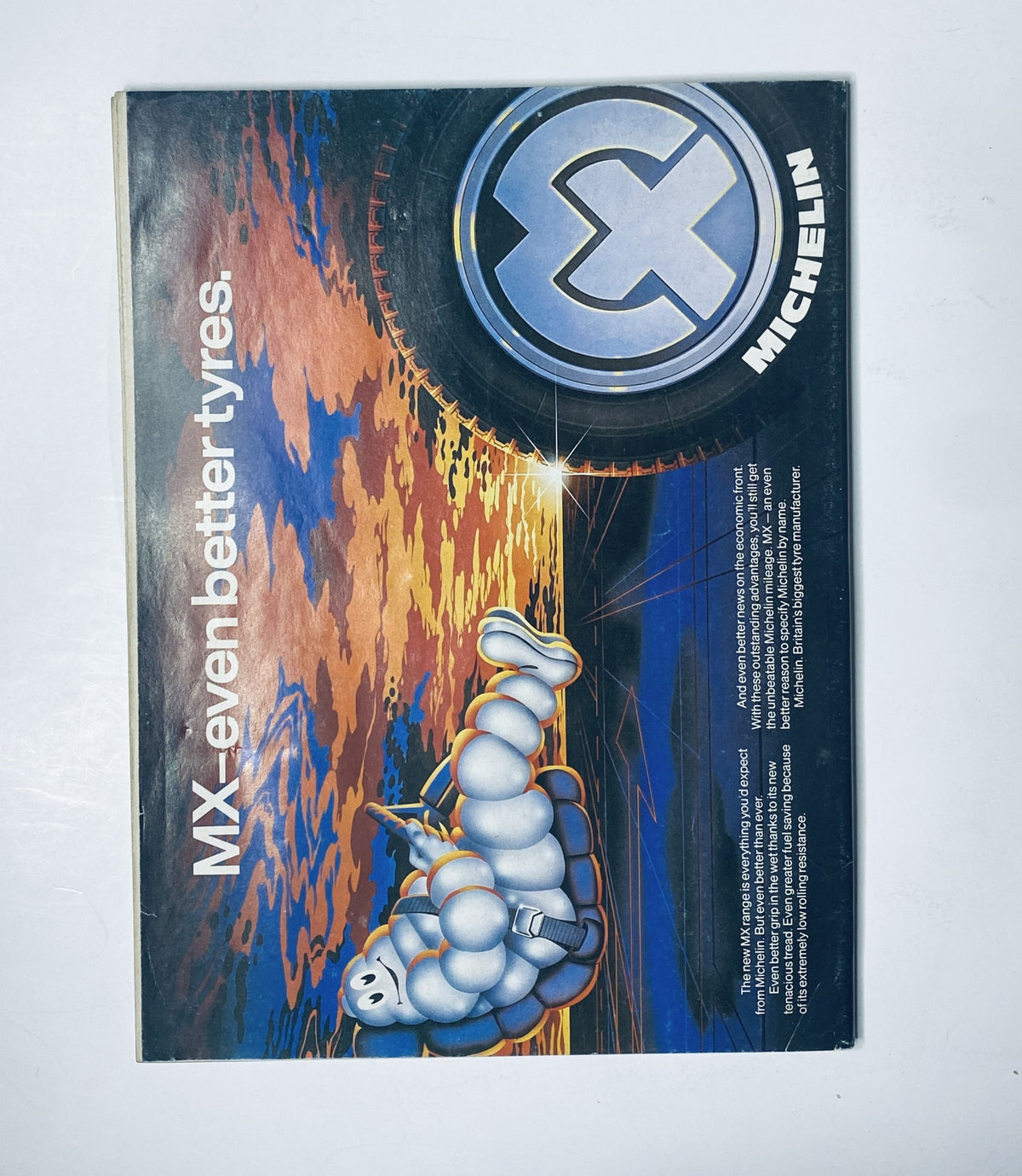 Back cover of Car Magazine March 1984 featuring an advertisement for Michelin tires, showcasing the Michelin Man logo against a colorful sunset background. The tagline promotes 'MX even better tires'.