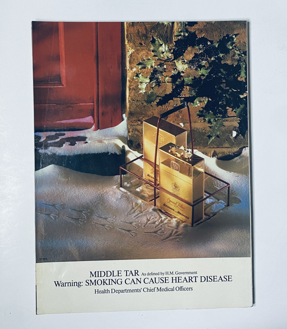 Public health warning poster titled 'Middle Tar' depicting tobacco packaging, emphasizing the message that smoking can cause heart disease, with an artistic image suggesting caution.
