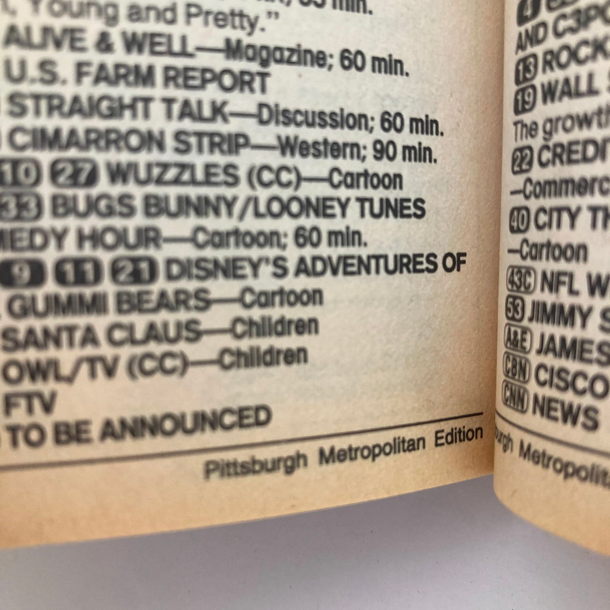 Inside page of TV Guide Magazine December 21-27, 1985 showing programming listings including classic cartoons and shows, from the Pittsburgh Metropolitan Edition.