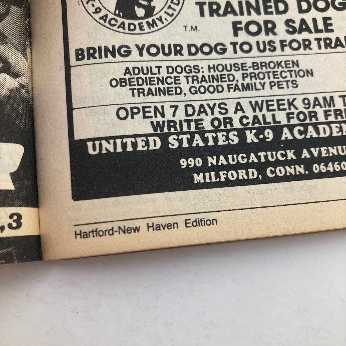 Advertisement from TV Guide Magazine September 28 1985 featuring dog training services at United States K-9 Academy in Milford, Connecticut, serving the Hartford-New Haven edition.