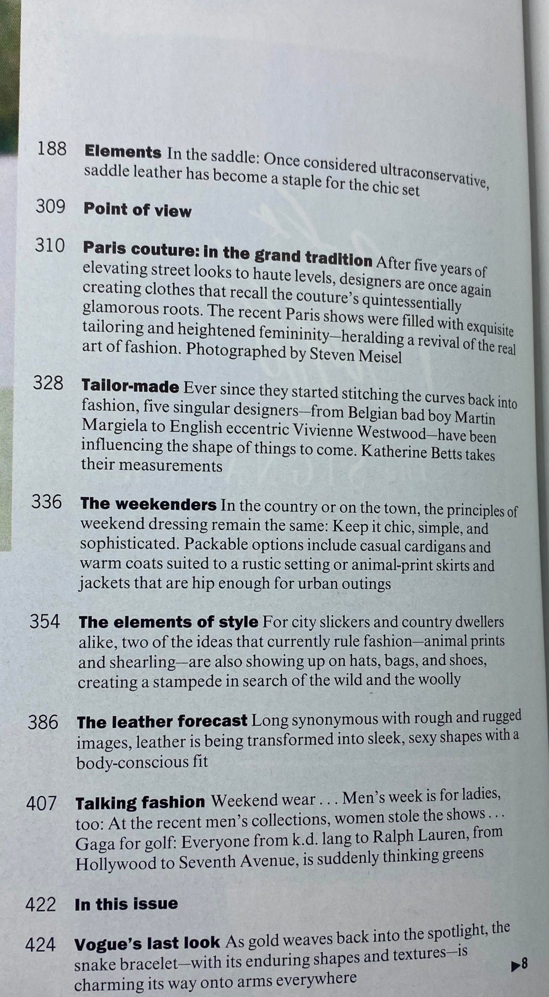 Interior page of Vogue Magazine October 1994 detailing articles on Paris couture, tailoring, and fashion trends.
