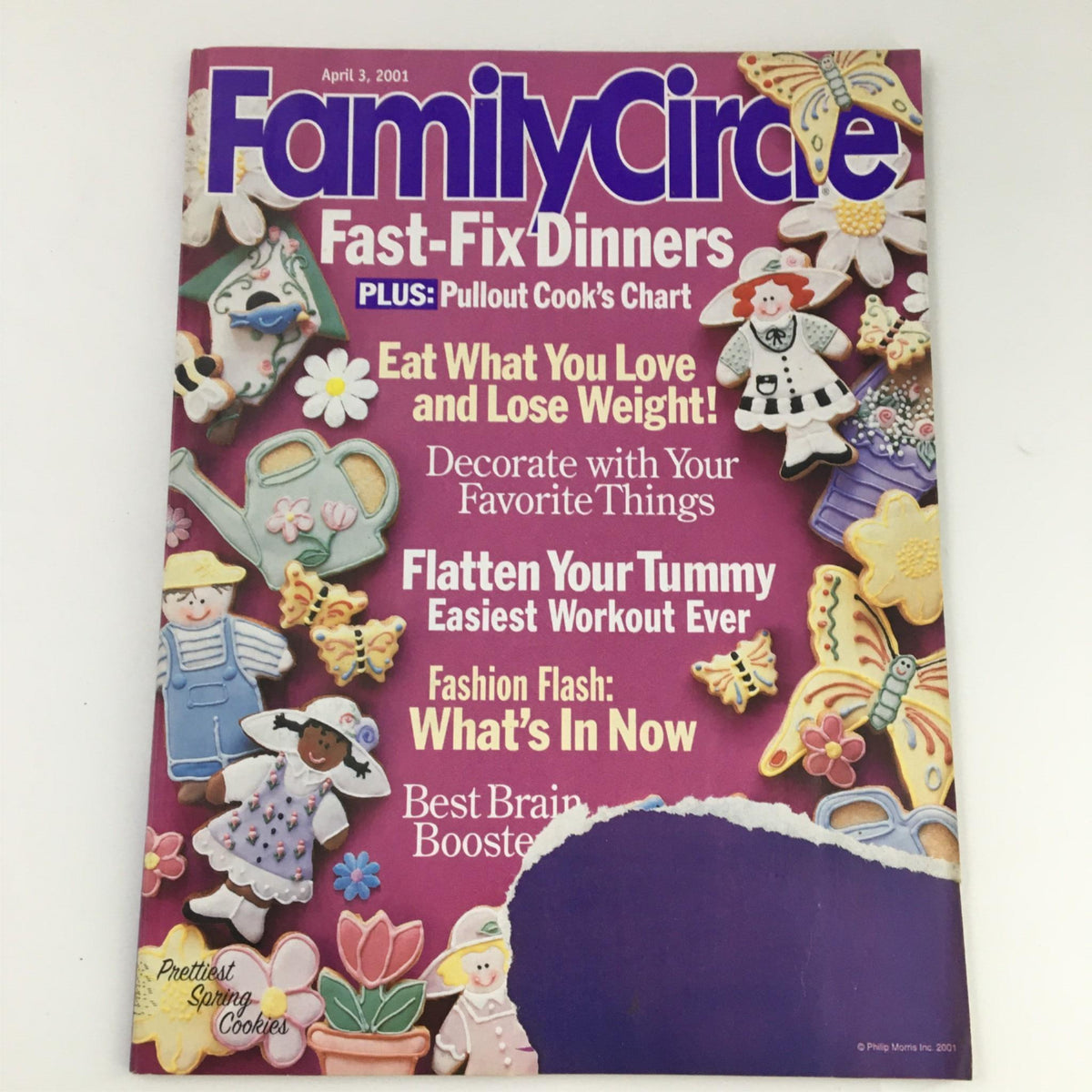 Cover of Family Circle Magazine April 3 2001 featuring Fast-Fix Dinners, Best Brain Booster, and decorative cookies, showcasing tips on weight loss and fitness.
