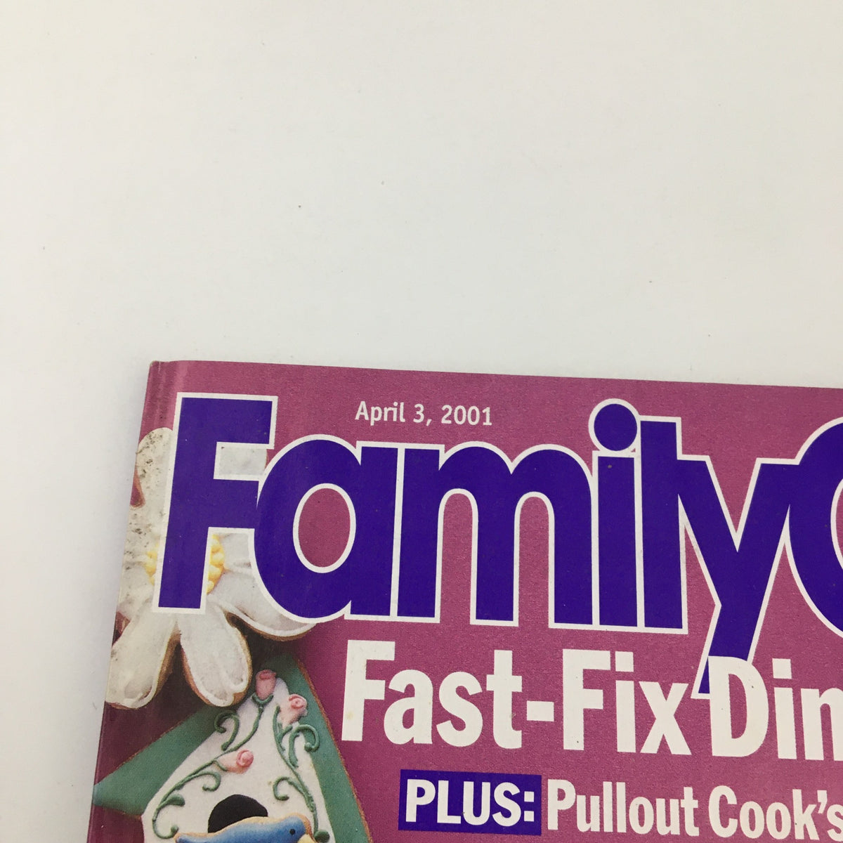 Cover of Family Circle Magazine dated April 3, 2001 featuring 'Fast-Fix Dinner & Best Brain Booster Feature'. Includes decorative elements related to cooking and family activities.
