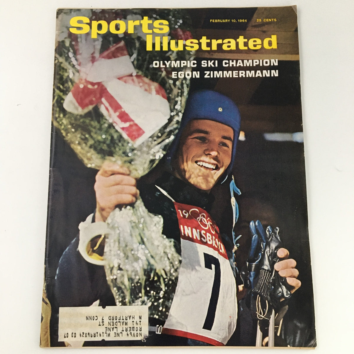 VTG Sports Illustrated Magazine February 10, 1964 featuring Olympic ski champion Egon Zimmermann, showcasing the cover with a victorious athlete holding a bouquet, a key piece for sports memorabilia collectors.