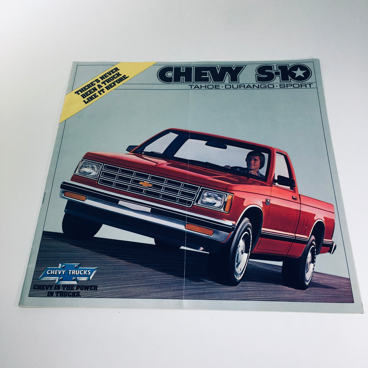 September 1981/4099 Chevy Trucks S-10 Tahoe Durango Sport Car Catalog Brochure featuring a vibrant red S-10 truck on the cover.