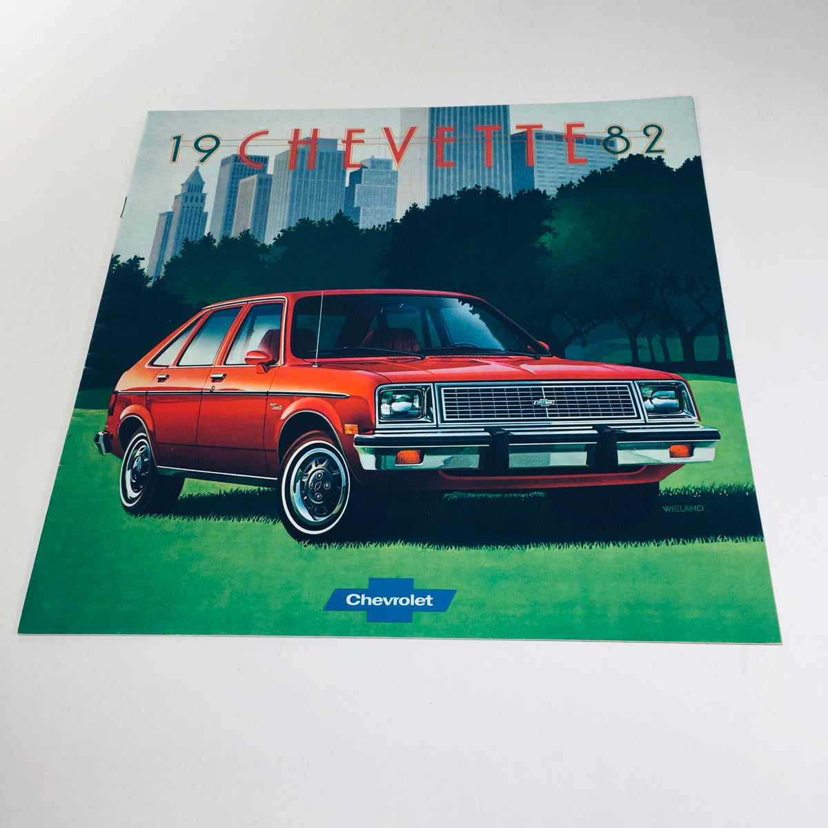 1982 Chevrolet Chevette 4089 - August 1981 Litho in U.S.A. Car Sales Brochure cover featuring a bright red Chevrolet Chevette parked in front of a city skyline.