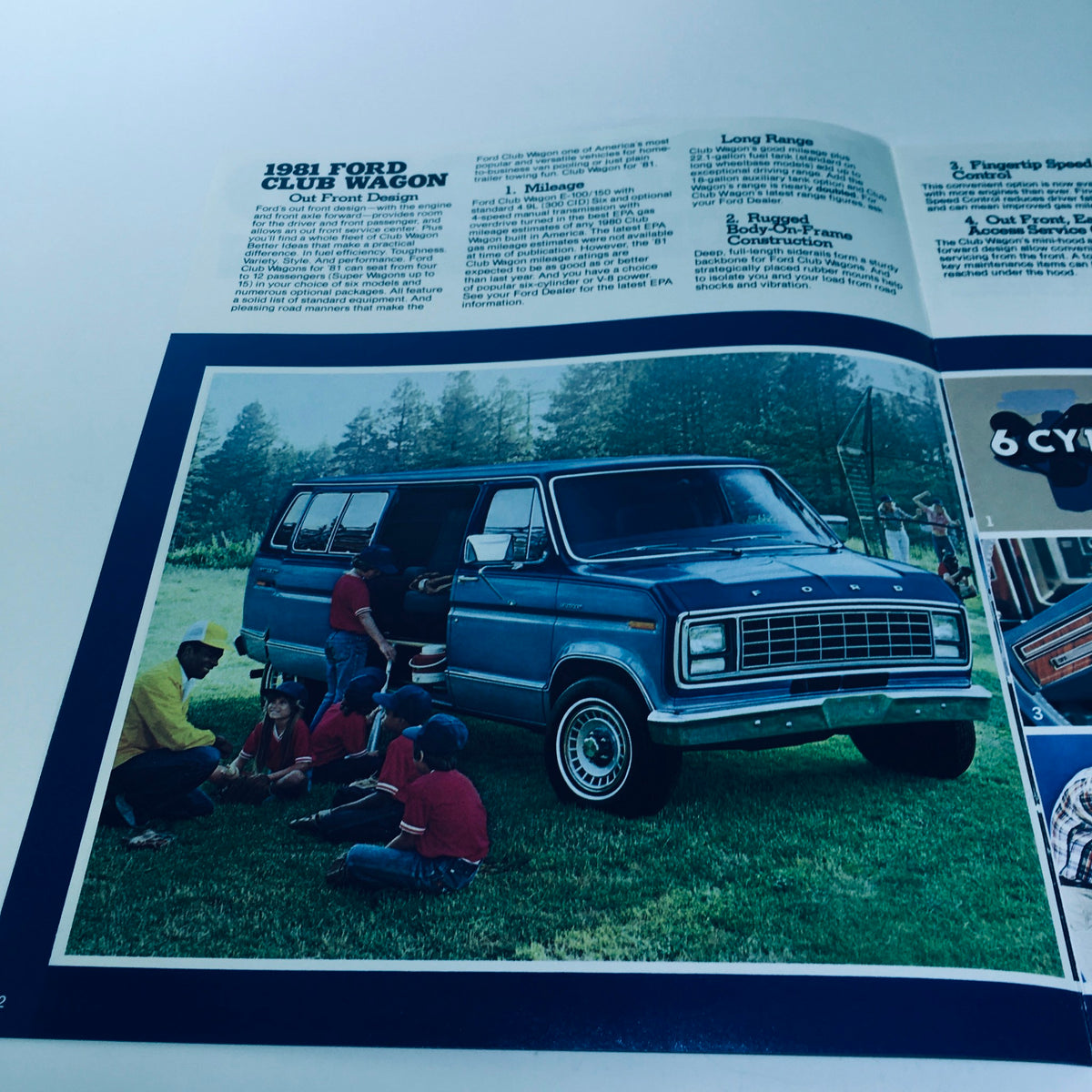Inside spread of the 1981 Ford Wagon Club Wagon V-8 300 CID 6 4-Speed Manual Car Sale Brochure showcasing the van in use with children playing outside.