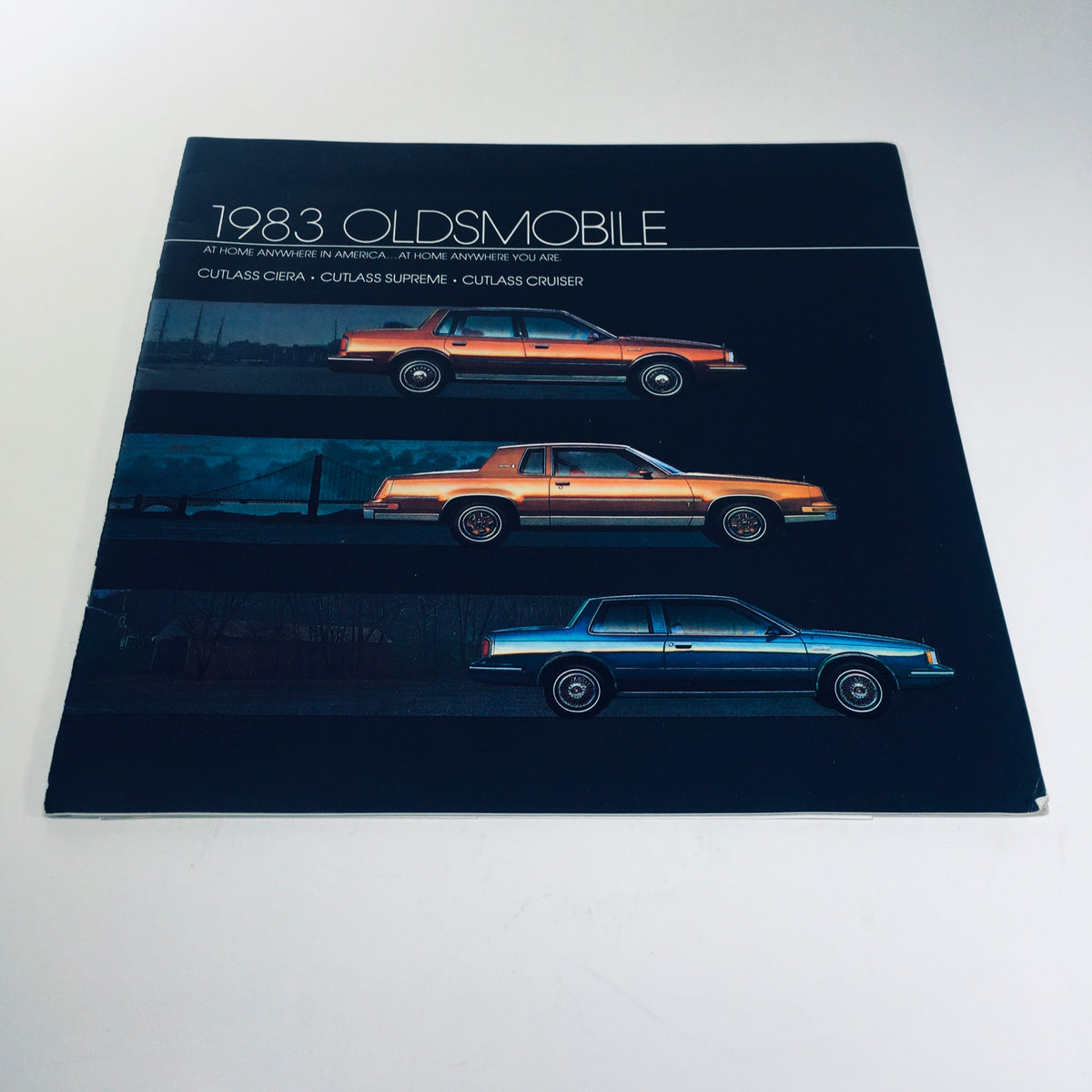 1983 Oldsmobile Cutlass Ciera, Supreme & Cruiser (110 Cid) L4 EFI Car Brochure cover featuring the Cutlass Ciera, Cutlass Supreme, and Cutlass Cruiser models.
