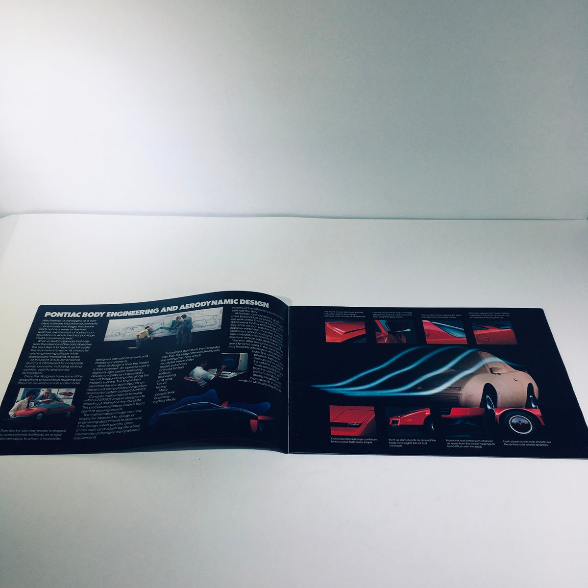 Interior view of the 1983 Pontiac 6000 brochure showcasing Pontiac's body engineering and aerodynamic design.