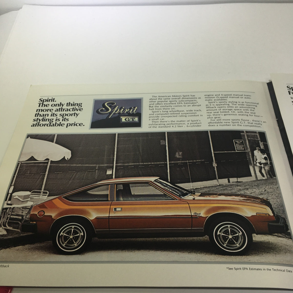 Interior page of the 1983 American Motors Eagle-SX/4-Concord-Spirit 6-Cylinder 4-Speed Car Brochure highlighting the attractive Spirit model with a vibrant orange color and sporty design.