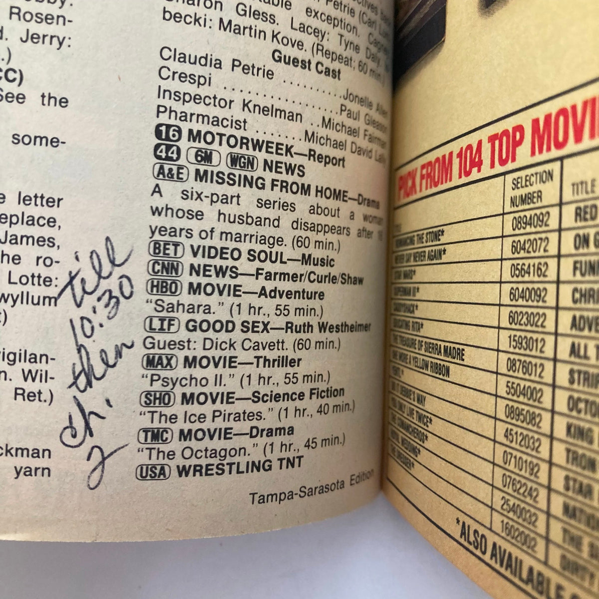 Inside pages of TV Guide Magazine dated March 23, 1985 featuring program listings and handwritten notes. Includes shows like 'Motorweek', 'Missing From Home', and 'Wrestling TNT'. Perfect for collectors of Diahann Carroll memorabilia from Tampa-Sarasota edition.