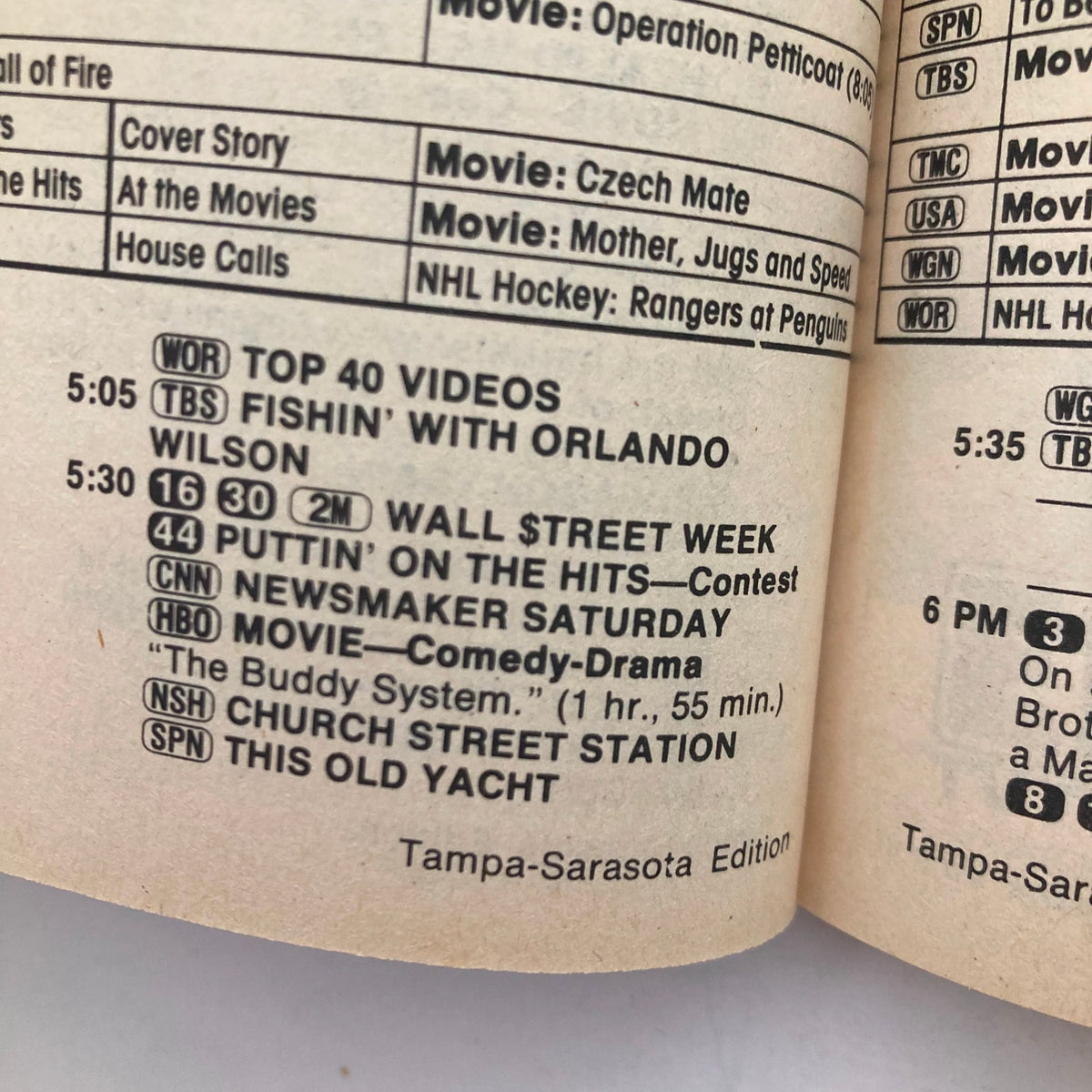 Inside page of TV Guide Magazine March 2 1985 showcasing the TV schedule and listings, including shows like 'Fishin' with Orlando Wilson' and 'Wall Street Week' within the Tampa-Sarasota edition.