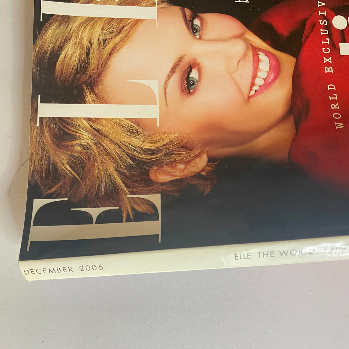 Close-up of the Elle UK Magazine December 2006 cover with Kylie Minogue, highlighting her glowing features and the magazine's title and date.